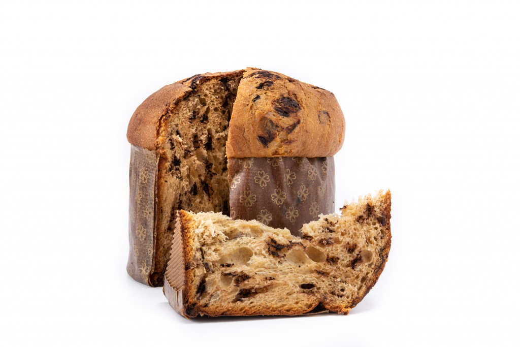 Chocolate chip panettone with a slice taken out on its side